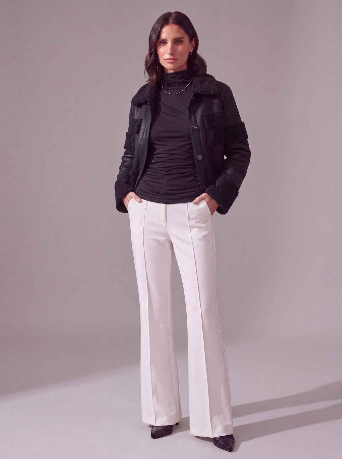PANTALONI FLARE BIANCHI