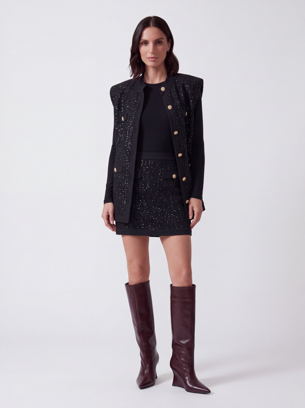 MINIGONNA NERA IN MAGLIA LUREX CON BOTTONI GIOIELLO
