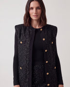 GILET LUNGO NERO IN MAGLIA LUREX CON BOTTONI GIOIELLO