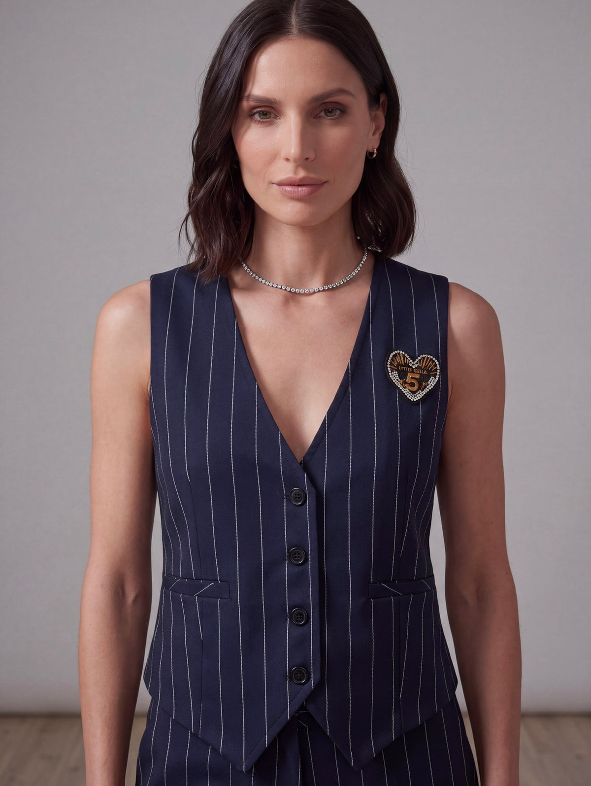 GILET GESSATO CON SPILLA