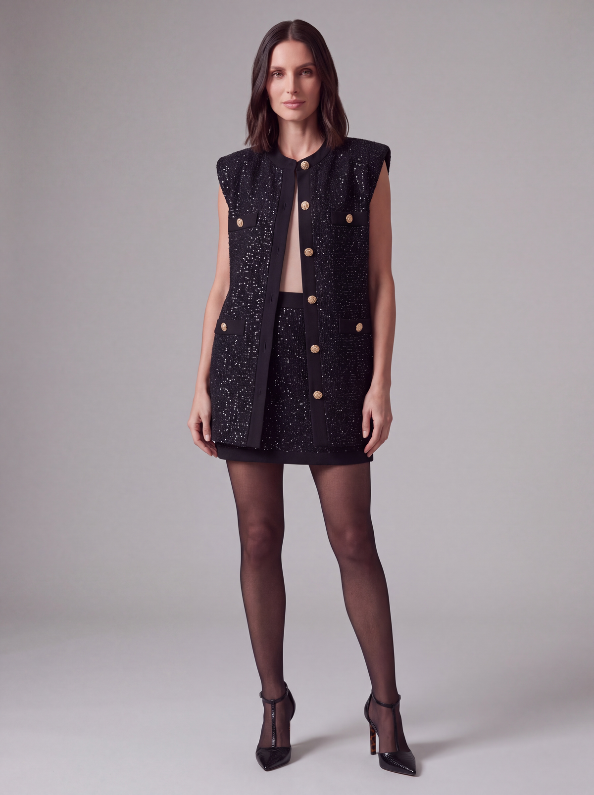 GILET LUNGO NERO IN MAGLIA LUREX CON BOTTONI GIOIELLO