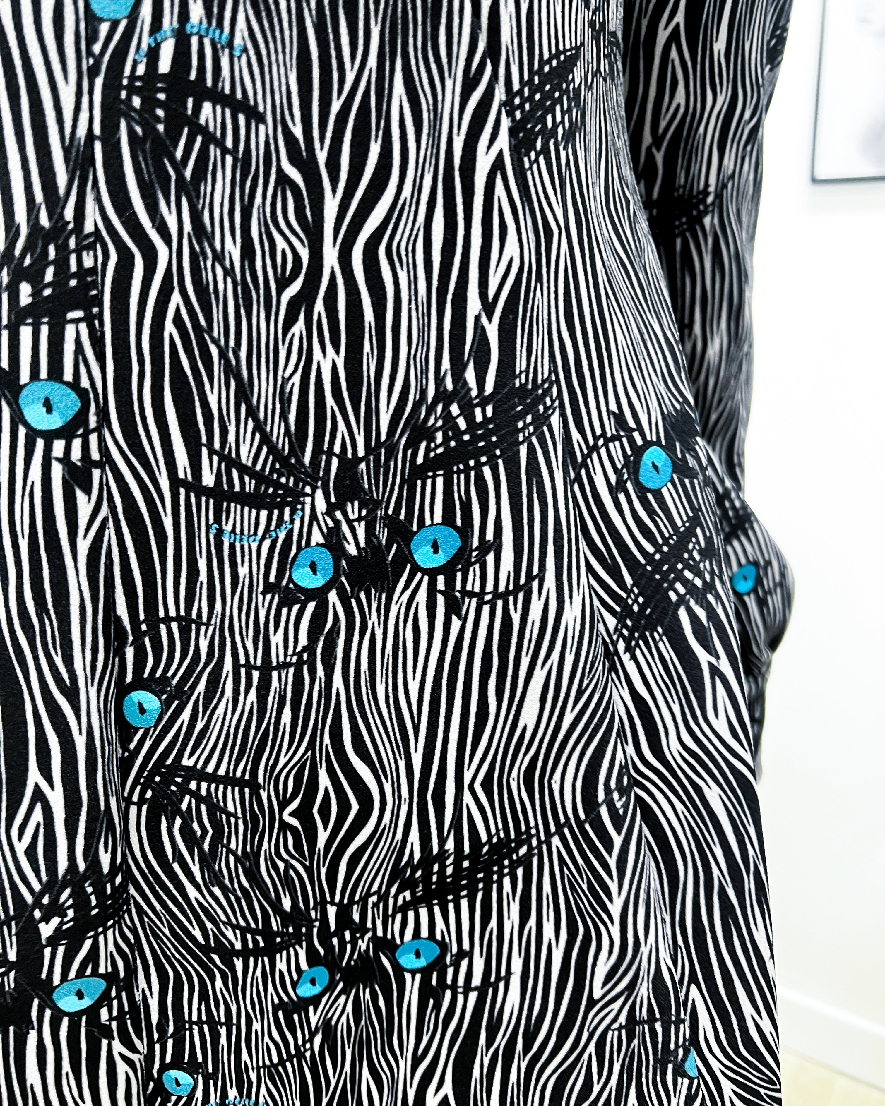 ABITO ASAN OCCHI DI GATTO