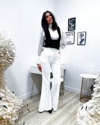 PANTALONI A ZAMPA BIANCHI