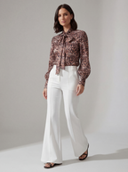 PANTALONI FLARE BIANCHI