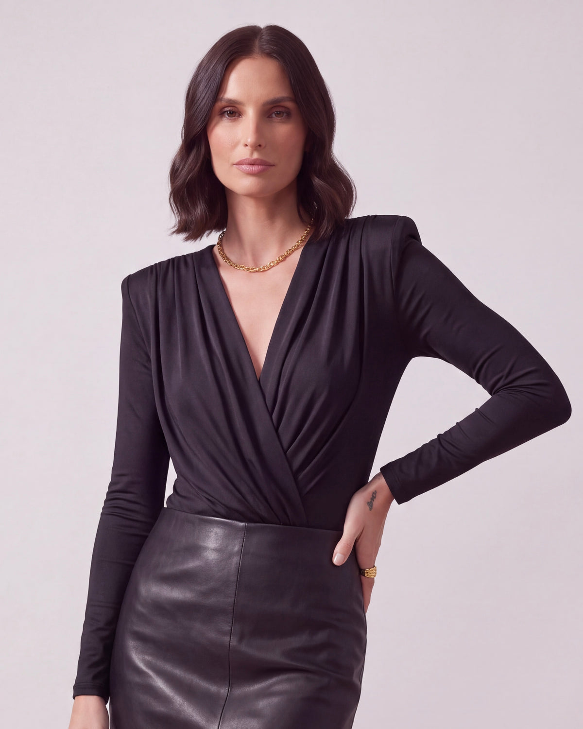 BODY NERO DRAPPEGGIATO CON SPALLE IMBOTTITE